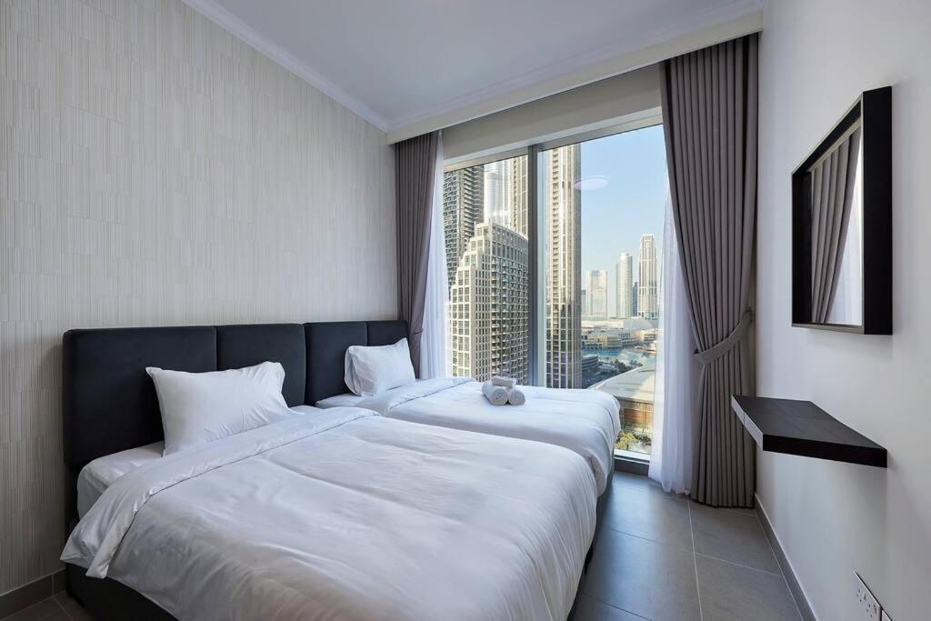 Tick - 4br Burj Khalifa Fountain Views 1 Appartement